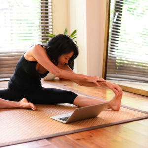 A woman working out at home.